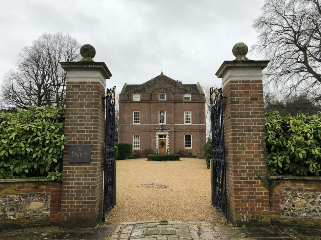 Elegant gate and entrance to the historic Deanery in Chichester, England.